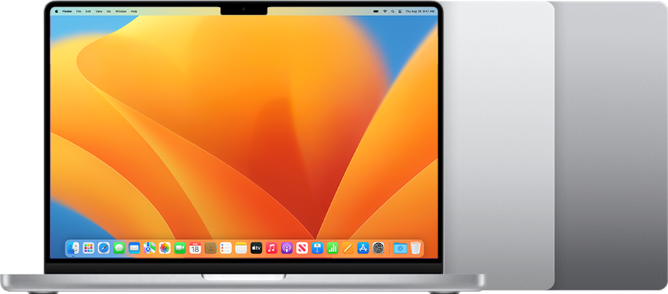 Apple MacBook Pro 14 laptop opened on a clean modern desk setup