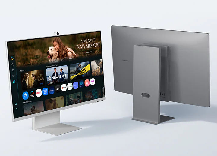 A Samsung Smart Monitor displaying a smart TV interface on a clean home office desk setup