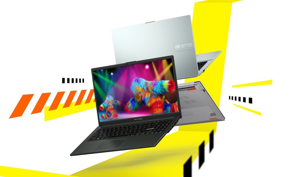 ASUS Vivobook Go 15 OLED laptop opened on a clean modern desk setup